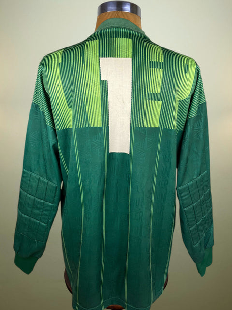 Green Inter Milan 1991-92 Goalkeeper jersey with Walter Zenga's number 1 stitched on the back on a mannequin against a beige background
