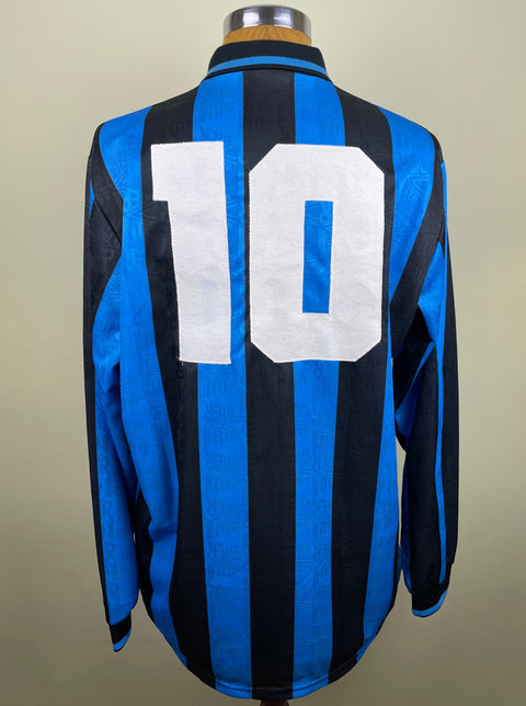 A navy blue and white striped Inter Milan 1993-94 match worn soccer jersey featuring the Inter Milan logo and Dennis Bergkamp's number 10 stitched on the back.