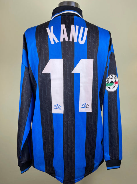 A long-sleeved match worn 1997-98 Inter Milan home jersey with black and blue stripes, number 11, and the name 'KANU' printed on the back.