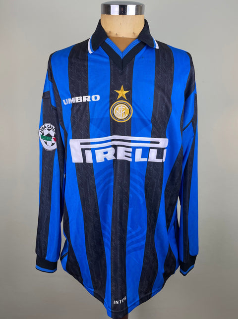 A long-sleeved match worn 1997-98 Inter Milan home jersey with black and blue stripes, number 11, and the sponsor Pirelli across the chest.
