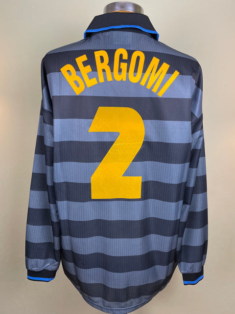 A long-sleeved match worn Beppe Bergomi UEFA Cup Inter Milan 1997-98 jersey with a striped pattern, predominantly in gray and blue, with the number 2 and the name BERGOMI printed on the back.