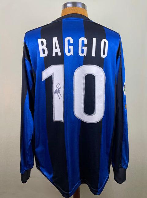 Roberto Baggio's Signed Inter Milan  1999-00 Home jersey on display with 'Baggio 10' printed on the back in bold letters, predominantly blue with black details.