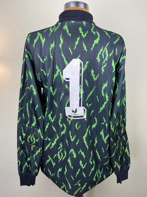 A long-sleeved match worn Stefano Tacconi Juventus goalkeeper jersey from the 1989 season with a green, black, and white camouflage pattern. The jersey features the number 1 on the back.