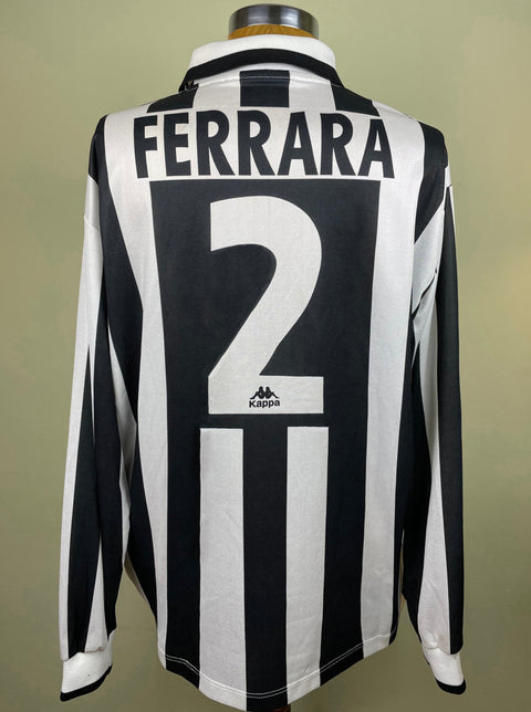 A long-sleeved black and white striped Juventus 1995-96 soccer jersey match worn by Ciro Ferrara with 'Ferrara' and the number '2' printed on the back.