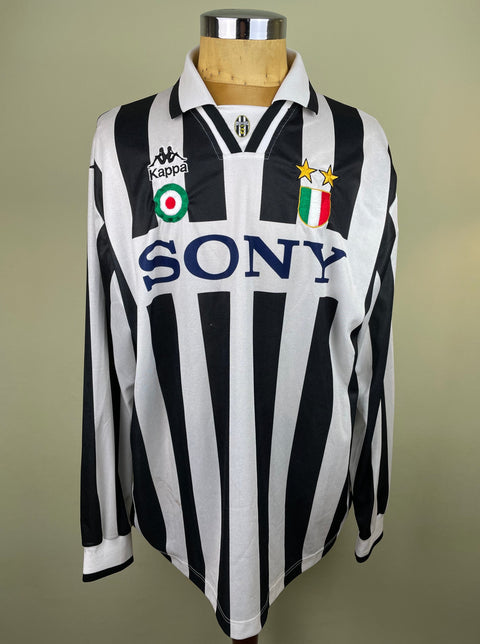 A long-sleeved black and white striped Juventus 1995-96 soccer jersey match worn by Ciro Ferrara with 'Sony' Sponsor on the chest, and kappa logo.