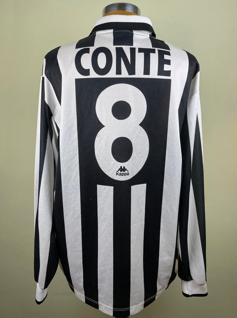 A long-sleeved black and white striped Juventus match worn 1995-96 jersey with the number 8 and the name 'CONTE' printed on the back.