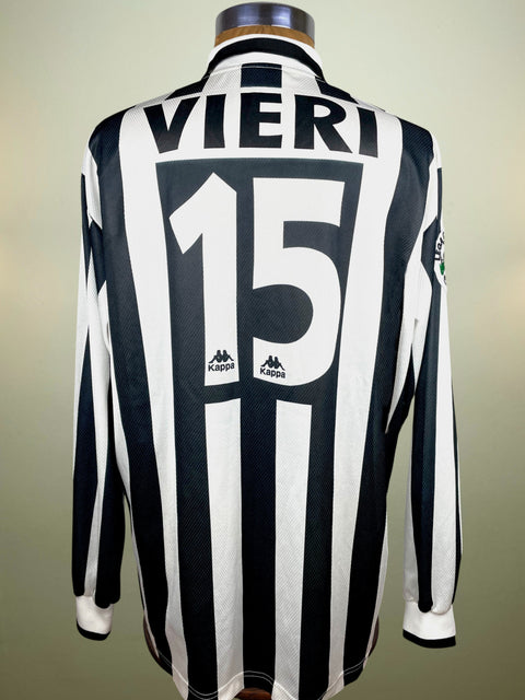 Black and white striped Christian Vieri Juventus home jersey from 1996 with number 15 and name 'Vieri' on a neutral background