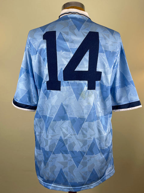 A short-sleeved Lazio 1990 home jersey featuring a geometric pattern in blue and white, with number 14 stitched into the back of the shirt.