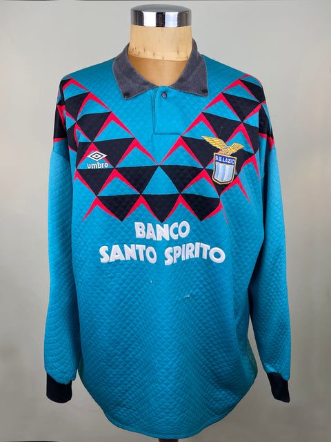 A blue and red geometric patterned Match worn Lazio 1991-92 Goalkeeper jersey featuring the Banco Santo Spirito sponsor on the chest