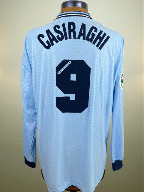 Match worn light blue long sleeve Lazio home shirt from the 1996-97 season worn by Pierluigi Casiraghi with name and number 9 in black flock across the front of the shirt. Made by Umbro.