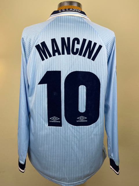 Match worn light blue long sleeve Lazio home shirt from the 1997-98 season worn by Roberto Mancini with name and number 10 in black flock across the front of the shirt. Made by Umbro.