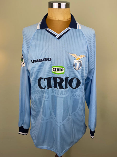 Match worn light blue long sleeve Lazio home shirt from the 1997-98 season worn by Roberto Mancini with Cirio Sponsor in black flock across the front of the shirt. Made by Umbro.