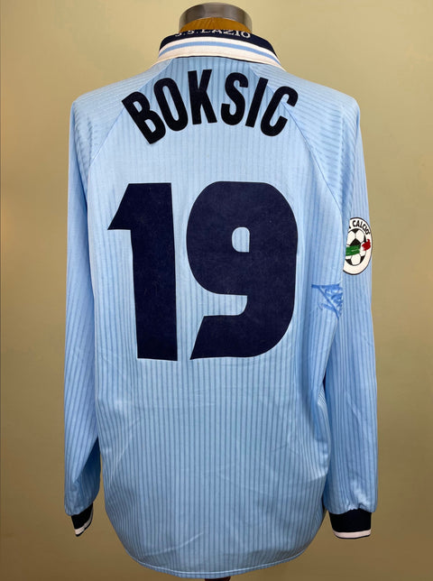 Match worn light blue long sleeve Lazio home shirt from the 1997-98 season worn by Alen Boksic with name and number 19 in black flock across the front of the shirt. Made by Umbro.