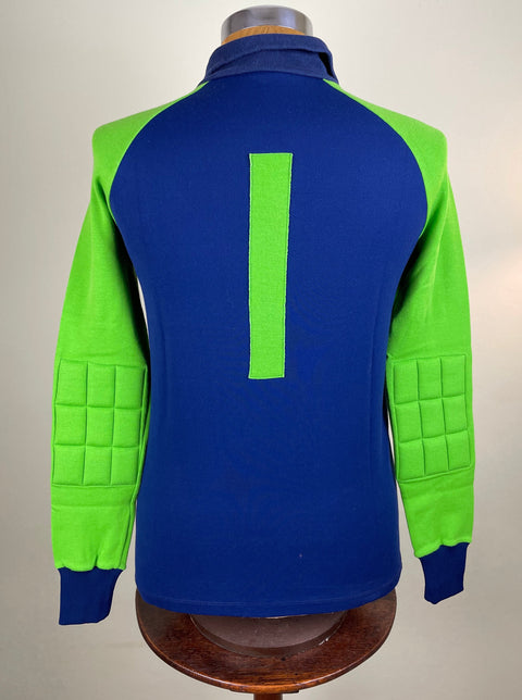Match worn blue and flourescent green long sleeve Napoli goalkeeper shirt from the 1982-83 season worn by Luciano Castellini with number 1 stitched into the back of the shirt. Made by Ennerre.