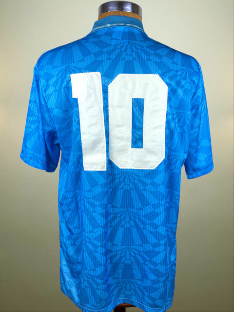 Blue Napoli 1992-93 jersey with Gianfranco Zola's number 10 on a mannequin against a beige background
