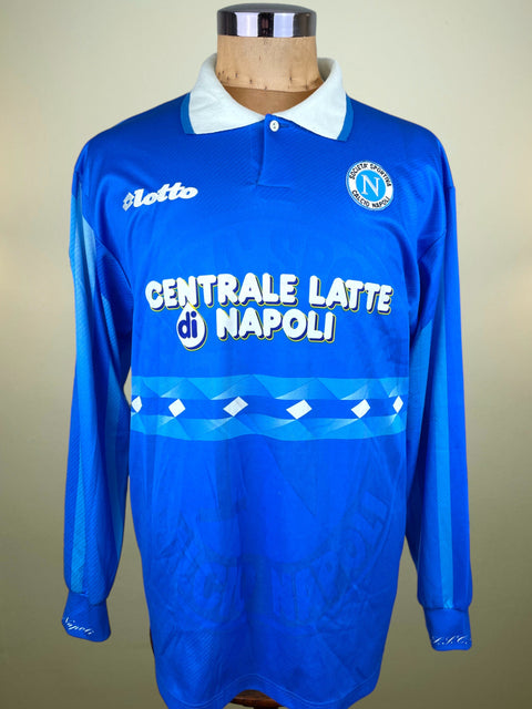 Blue Napoli Lotto 1996-97 jersey with centrale Latte di Napoli Sponsor on a mannequin against a neutral background