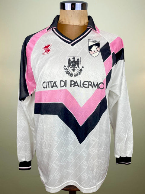 Match worn Pink and white long sleeve Palermo away shirt from the 1990-91 season with Citta di Palermo sponsor across the chest. Made by ABM.