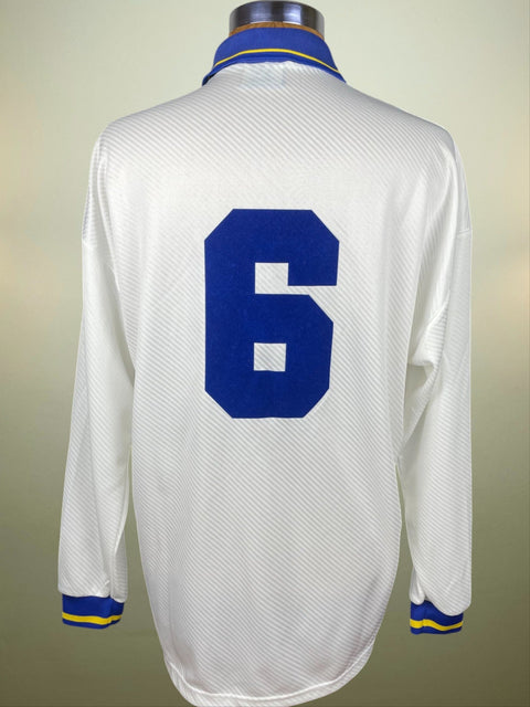 Match worn White Fernando Couto long sleeve Parma home shirt from the 1994-95 season, with number 6 in light flock. Made by Umbro.