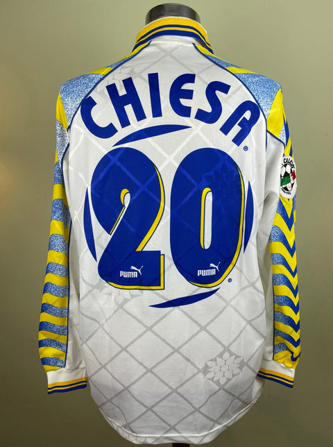 Match worn white Enrico Chiesa Parma long sleeve home shirt from the 1996-97 season, with name and number 20 in the fabric of the shirt. Made by Puma.