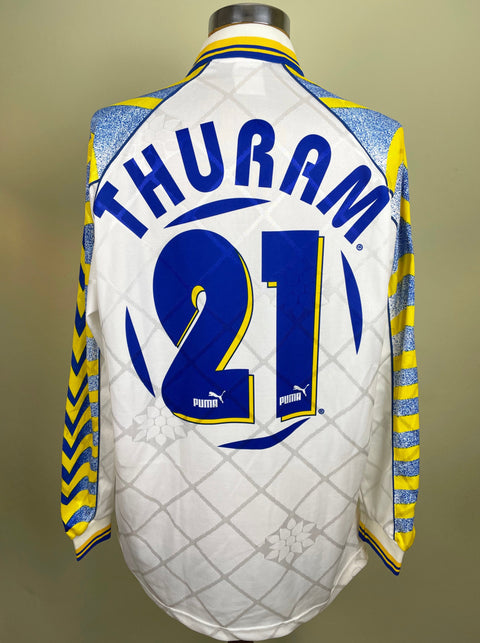 Match worn white Lilian Thuram Parma long sleeve home shirt from the 1996-97 season, with name and number 21 in the fabric of the shirt. Made by Puma.