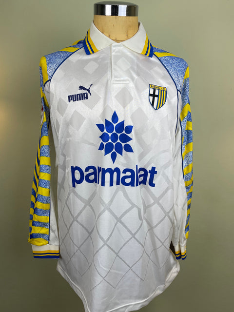 Match worn white Lilian Thuram Parma long sleeve home shirt from the 1996-97 season, with Parmalat sponsor across the chest in the fabric of the shirt. Made by Puma.