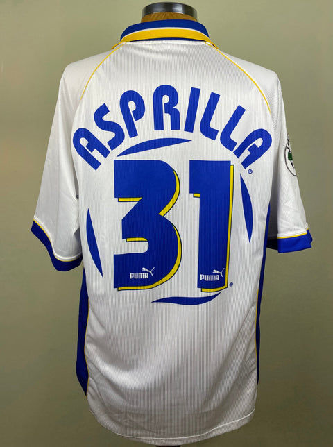 Match worn white Faustino Asprilla Parma short sleeve home shirt from the 1997-98 season, with name and number 31 in the fabric of the shirt. Made by Puma.