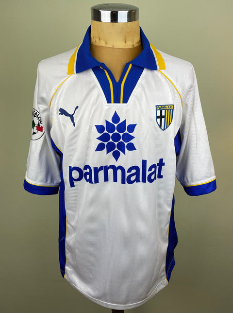 Match worn white Faustino Asprilla Parma short sleeve home shirt from the 1997-98 season, with Parmalat sponsor across the chest in the fabric of the shirt. Made by Puma.