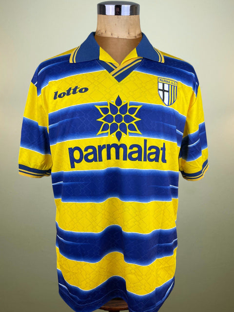 Match worn yellow Fabio Cannavaro Parma short sleeve home shirt from the 1998-99 season, with Parmalat sponsor across the chest in the fabric of the shirt. Made by Lotto.