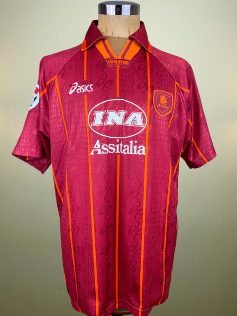 Maroon AS Roma 1996/97 home shirt, short sleeves, INA Assitalia sponsor across the chest. Match-worn by Marco Delvecchio. Asics logo.