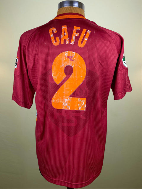 Maroon AS Roma 1997-98 jersey made by Diadora with 'CAFU' and number '2' on a beige background