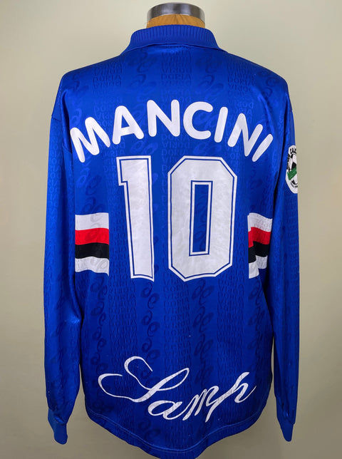 Blue Sampdoria 1996/97 home shirt, long sleeves, MANCINI 10 in white plastic lettering across the back, Asics logo. Match-worn Roberto Mancini.