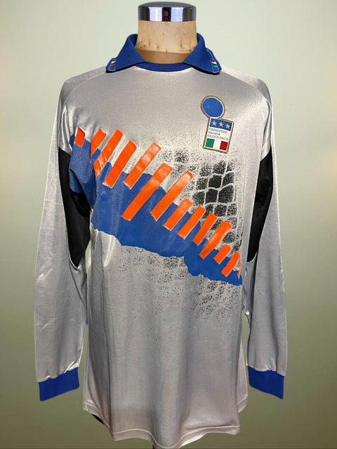 Gray Match worn Gianluca Pagliuca 1992 Italy Goalkeeper Jersey with orange and blue design by Diadora on a mannequin against a plain background