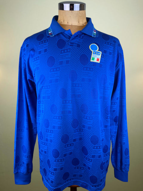 Blue Italu Diadora 1994 Home jersey with a logo on a mannequin against a beige background