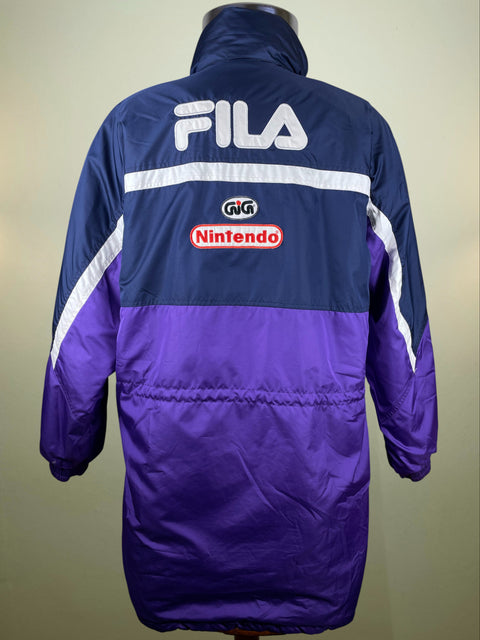 Blue and purple Fiorentina jacket with Fila and Nintendo logos on a neutral background