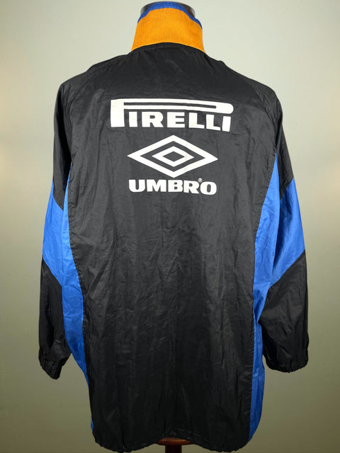 Black Inter Milan jacket with Pirelli and Umbro logos on a plain background