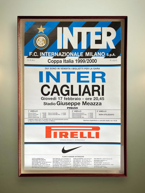 Framed poster of F.C. Internazionale Milano with event details and sponsor logos.