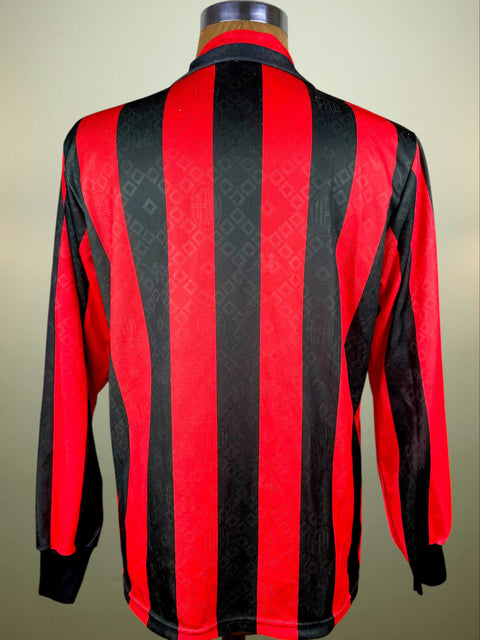 Red and black striped AC Milan 1989 Home shirt on a mannequin against a neutral background