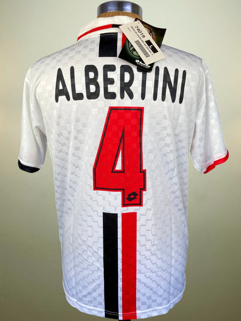 White AC Milan soccer jersey shown from the back on a mannequin, featuring 'ALBERTINI' and the number 4 in red with black outlines, plus black and red vertical stripes.