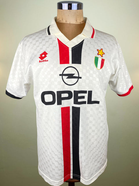 White AC Milan Away 1996-97 jersey with black and red stripes and Opel logo on a mannequin against a plain background