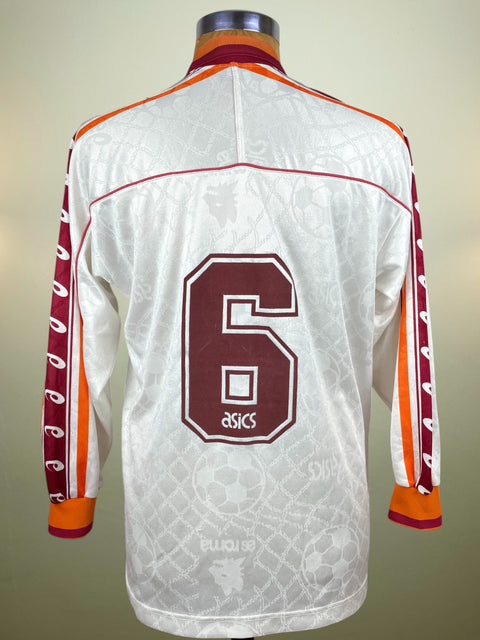 White AS Roma 1995-96 Away jersey with maroon number 6 and Asics logo on a mannequin against a beige background