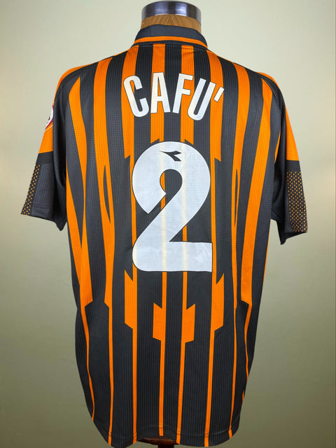 Black and orange striped AS ROma jersey with 'CAFU' and number '2' on a mannequin against a neutral background