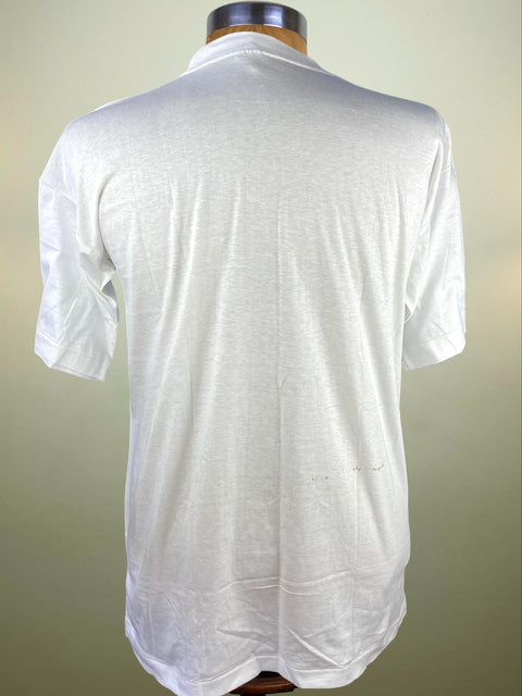 White t-shirt on a mannequin against a plain background