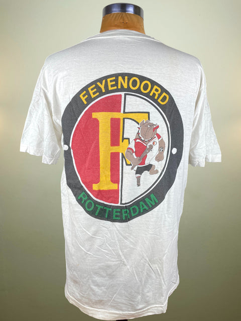 White t-shirt with Feyenoord Rotterdam logo on a mannequin against a neutral background