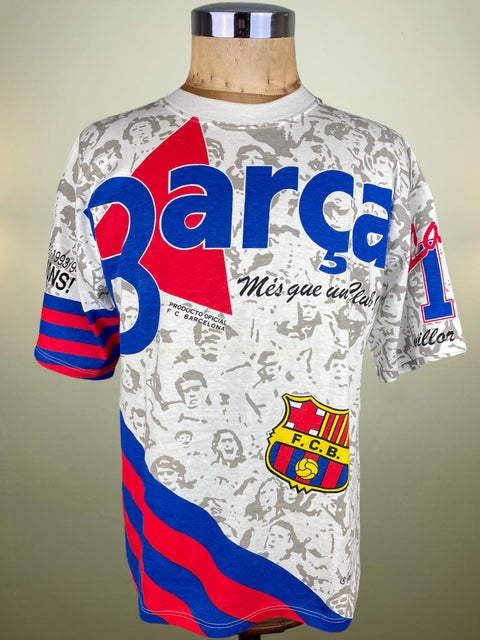 Barcelona sports jersey on a mannequin against a plain background