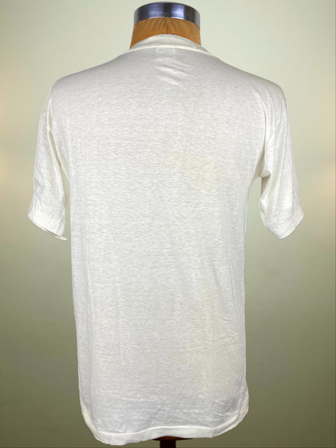 White textured t-shirt on a mannequin against a plain background