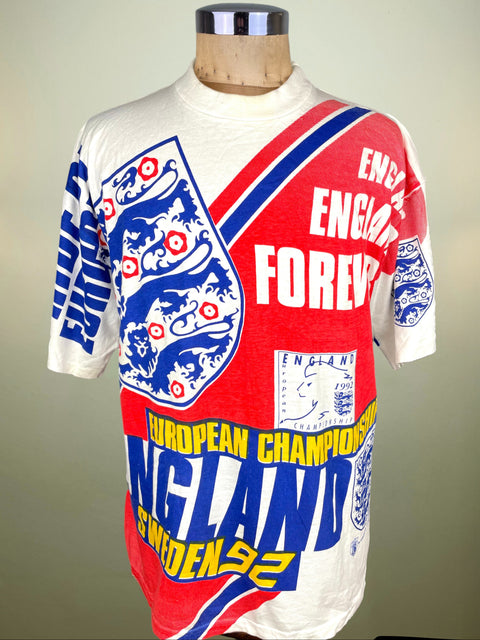 Vintage Euro 92 England T-shirt with bold all-over print, England logo and the words European Championship Sweden 92 across the bottom
