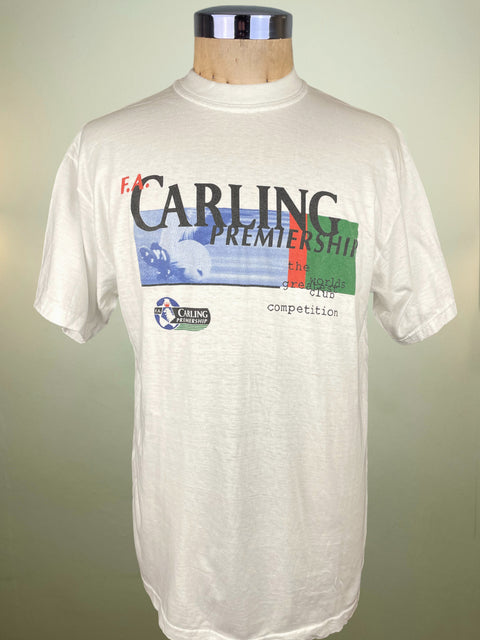 White t-shirt with Carling Premiership graphics on a mannequin against a plain background