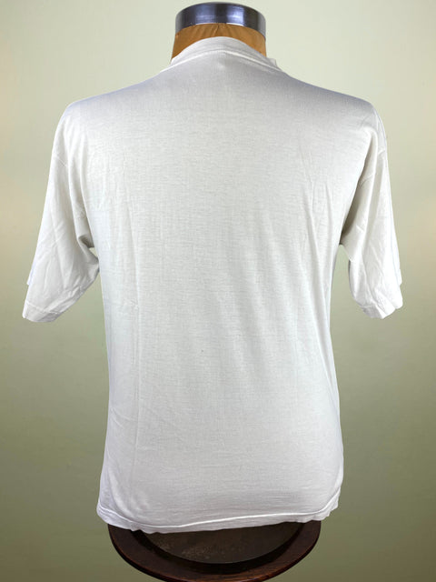 White t-shirt on a mannequin against a plain background