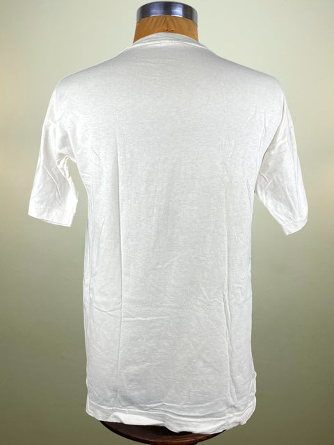 White t-shirt on a mannequin against a plain background