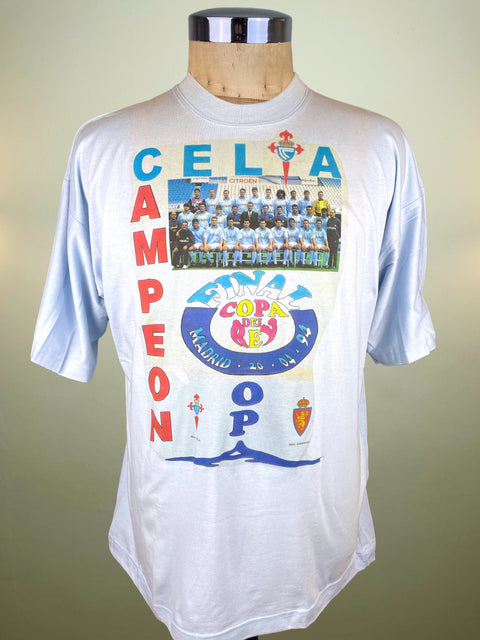 White t-shirt with colorful graphics and text on a mannequin against a plain background